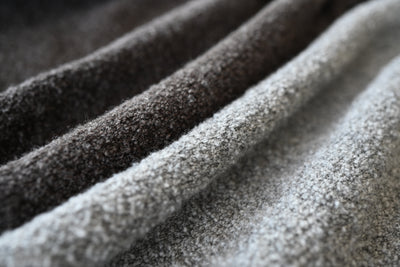 ゆったりシルエットのあったかブークレニット